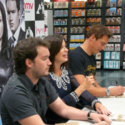 Gareth, Eve and John signing in Cardiff