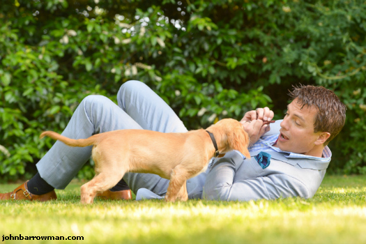 John with hearing dog, Mia